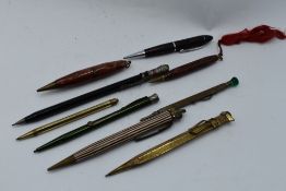 A selection of nine mechanical pencils of various styles