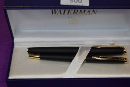 A Waterman Fountain pen and Ballpoint pen set in matt black, cartridge fill with a convertor. In