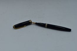 A Wyvern 202 button fill fountain pen in Blue with single broad band with Wyvern medium nib.