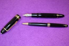 A Montblanc Meisterstuck Solitaire fountain pen and ballpoint pen set in black. In original box with