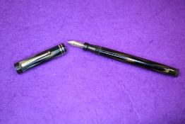 A Parker Lucky Curve True Blue button fill fountain pen with two narrow bands to cap having a Parker