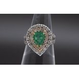 Emerald an diamonds ring