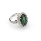 Diamonds and green stone ring