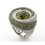 Peridots and diamonds ring