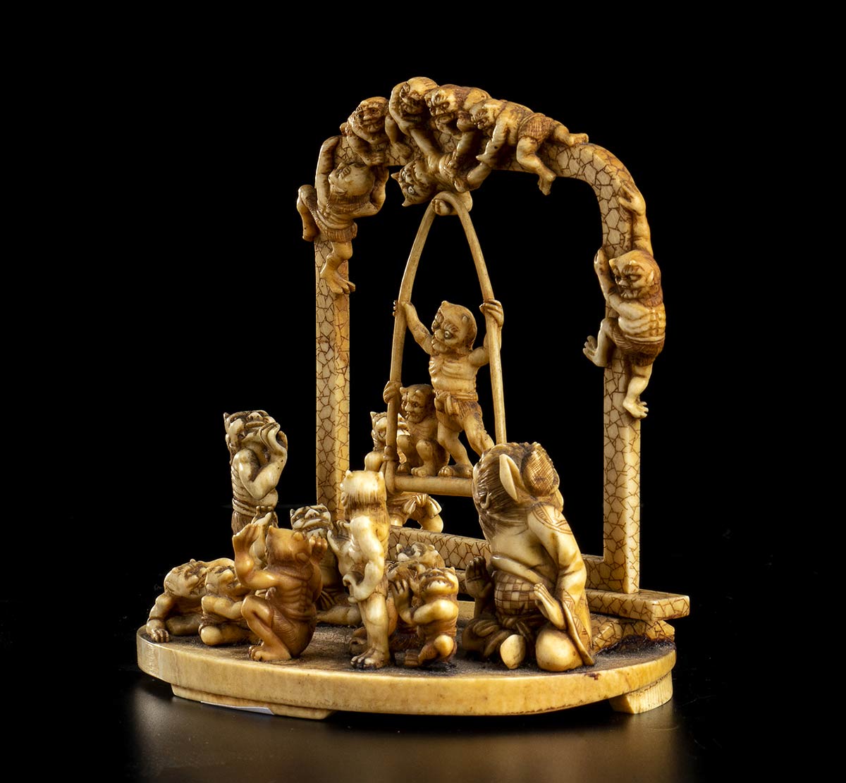 AN IVORY OKIMONO WITH ONI ON A SWINGJapan, Meiji period - Image 2 of 4