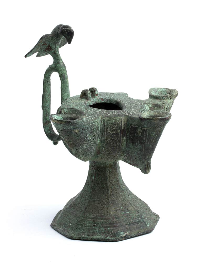 A TRIPLE-WICKED INCISED BRONZE OIL LAMPIran, Khorasan, 12th-13th century