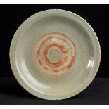 A CÉLADON GLAZED CERAMIC DISHChina, Ming dynasty