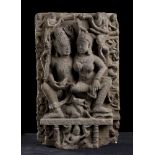 A STONE RELIEF WITH UMA-MAHESHVARANorthern India, Rajasthan (?), 10th-11th century