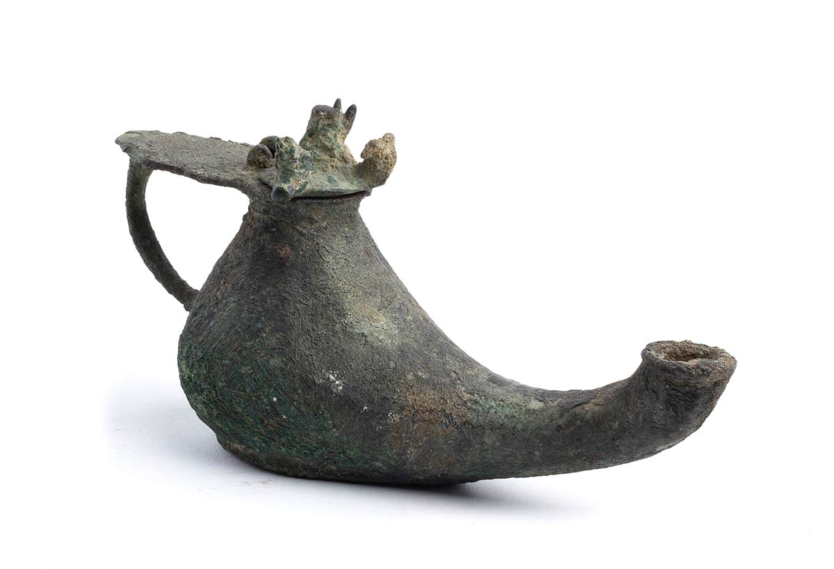 A BRONZE OIL LAMP, CHERAGHIran, Khorasan, 12th – 13th century.
