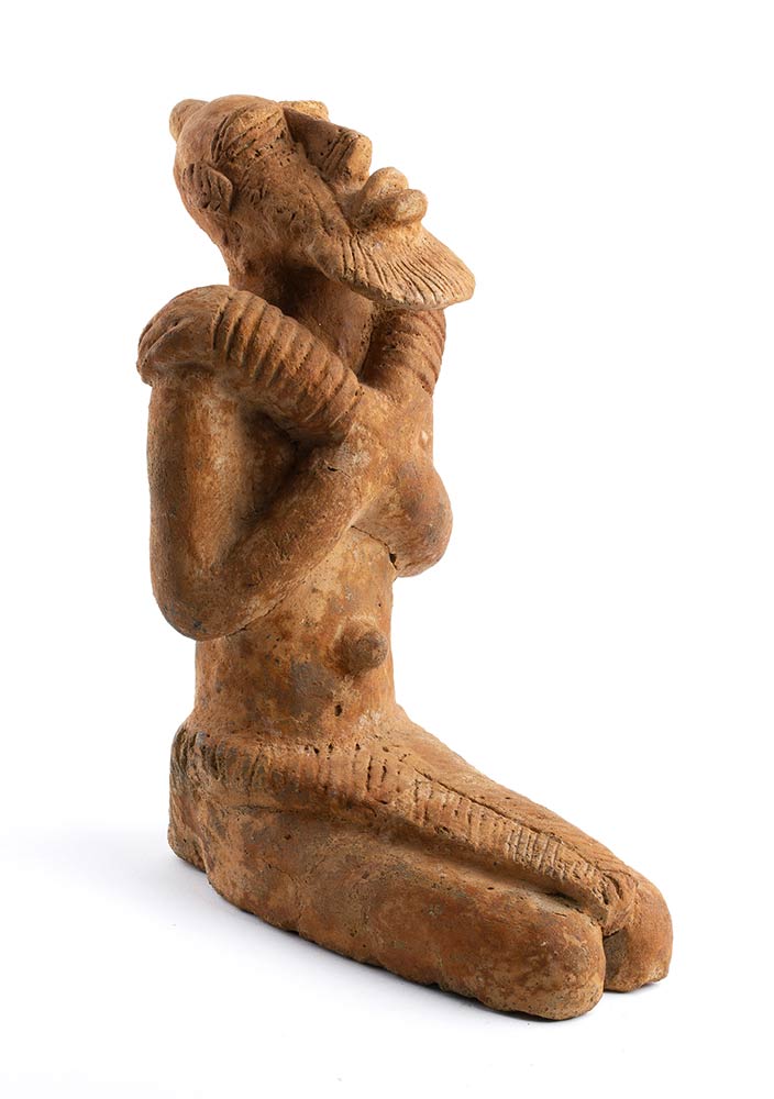 A DJENNÉ TERRACOTTA KNEELING FIGURE Mali