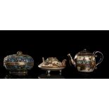 TWO 'SATSUMA' CERAMIC SMALL TEAPOTS AND AN ENAMELED SILVER CIRCULAR BOX AND COVERChina Japan, ea