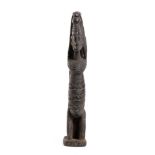 A WOOD SCULPTURE OF A KNEELING FIGUREMali, Dogon