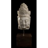 A MARBLE HEAD OF A BODHISATTVA China, probably Ming dynasty