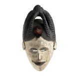 A PAINTED WOOD MASKNigeria, Igbo