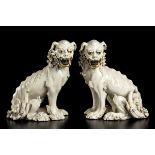 A PAIR OF GLAZED CERAMIC BUDDHIST LIONS Japan, 19th century