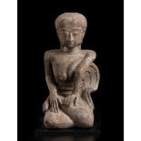 A TERRACOTTA KNEELING FEMALE FIGURE Indonesia, Majapahit