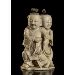 AN IVORY DOUBLE SNUFF BOTTLE SHAPED AS TWO CHILDREN China, early 20th century