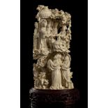 AN IVORY GROUP WITH FIGURES China, early 20th century