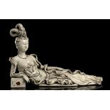 A 'BLANC DE CHINE' PORCELAIN RECUMBENT GUANYIN China, 20th century