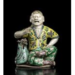 A 'FAMILLE VERTE' PORCELAIN SCULPTURE WITH XIANLONG LOHAN China, Qing dynasty, 19th century