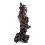 A LARGE ROOT CARVING OF A GUANYIN China, late Qing dynasty