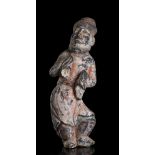 A PAINTED POTTERY FIGURE OF A BEARDED FOREIGNER China, Tang dynasty style