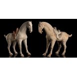 A PAIR OF PAINTED CERAMIC HORSES China, Tang dynasty style