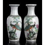 A PAIR OF PORCELAIN BALUSTER VASES WITH POLYCHROME DECORATION China, 20th century