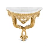 A SMALL GILTWOOD AND MARBLE TOP CONSOLE TABLE, French 19th century, the bowed frieze carved with a