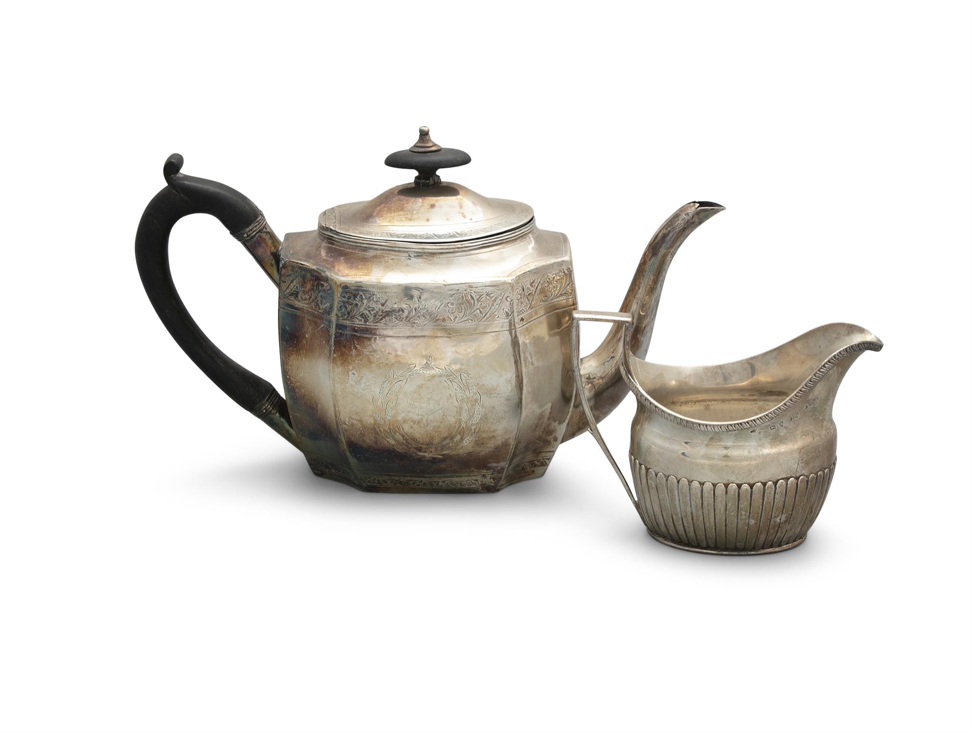 A GEORGE III SILVER BRIGHT CUT TEAPOT, London c.1802, mark of Joseph Bradley, the domed hinged lid