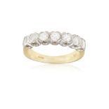 A DIAMOND HALF ETERNITY RING, composed of seven brilliant-cut diamonds within collet-setting,