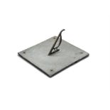AN IRISH 19TH CENTURY ENGRAVED SLATE SUNDIAL, of square form, with bronze gnomon, engraved with