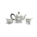 A SILVER THREE PIECEE TEA SERVICE, London c. 1907, mark of Charles Bayton & Sons Ltd, comprising a