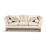 A THREE-SEATER SOFA BY LINLEY, of rectangular form, upholstered in gold/cream damask, with three
