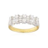 A DIAMOND RING, the frontispiece set with a series of baguette-cut diamonds between duos of