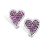 A PAIR OF PINK SAPPHIRE AND DIAMOND 'HEART' EARRINGS, composed of pavé-set circular pink sapphires