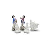 A PAIR OF DERBY PORCELAIN FIGURES OF A DRUMMER AND A PIPER, each dressed in 18th century garb and