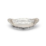 AN EDWARDIAN SILVER OVAL FRUIT DISH, Birmingham c.1910, mark of James Woods & Sons, the raised