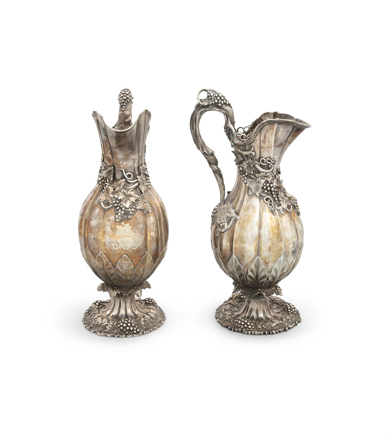 A PAIR OF VICTORIAN IRISH SILVER WINE EWERS, Dublin c. 1840, makers mark of James Fray, each of - Image 2 of 3