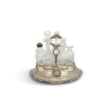 A GEORGE III IRISH SILVER CRUET STAND, Dublin c.1818, mark of Edward Power, the seven ring