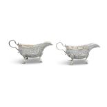 A PAIR OF IRISH CHASED SILVER SAUCEBOATS, Dublin 1911, mark of William Egan of Cork, each