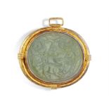 A JADEITE JADE PENDANT, composed of a large oval green jadeite jade with engravings depicting a