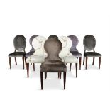 A MATCHED SET OF EIGHT MAHOGANY FRAMED MODERN UPHOLSTERED DINING CHAIRS, the padded oval backs and