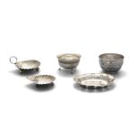 A COLLECTION OF SILVERWARE comprising: two small sugar bowls; two butter shells, and an oval bon bon
