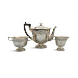 AN IRISH THREE PIECE SILVER TEA SERVICE, Dublin c.1911, retailed by West & Son, comprising;