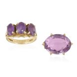 AN AMETHYST BROOCH WITH AN AMETHYST THREE-STONE RING, the brooch set with an oval mixed-cut amethyst