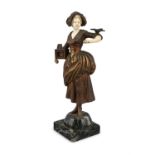 AFTER GEORGE OMERTH (1895 - 1925) Lady with bird and bird cage Ivory and gilt bronze on marble base,