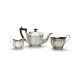 A SILVER THREE PRICE TEA-SERVICE, London c.1898, maker's mark rubbed, comprising teapot, sugar