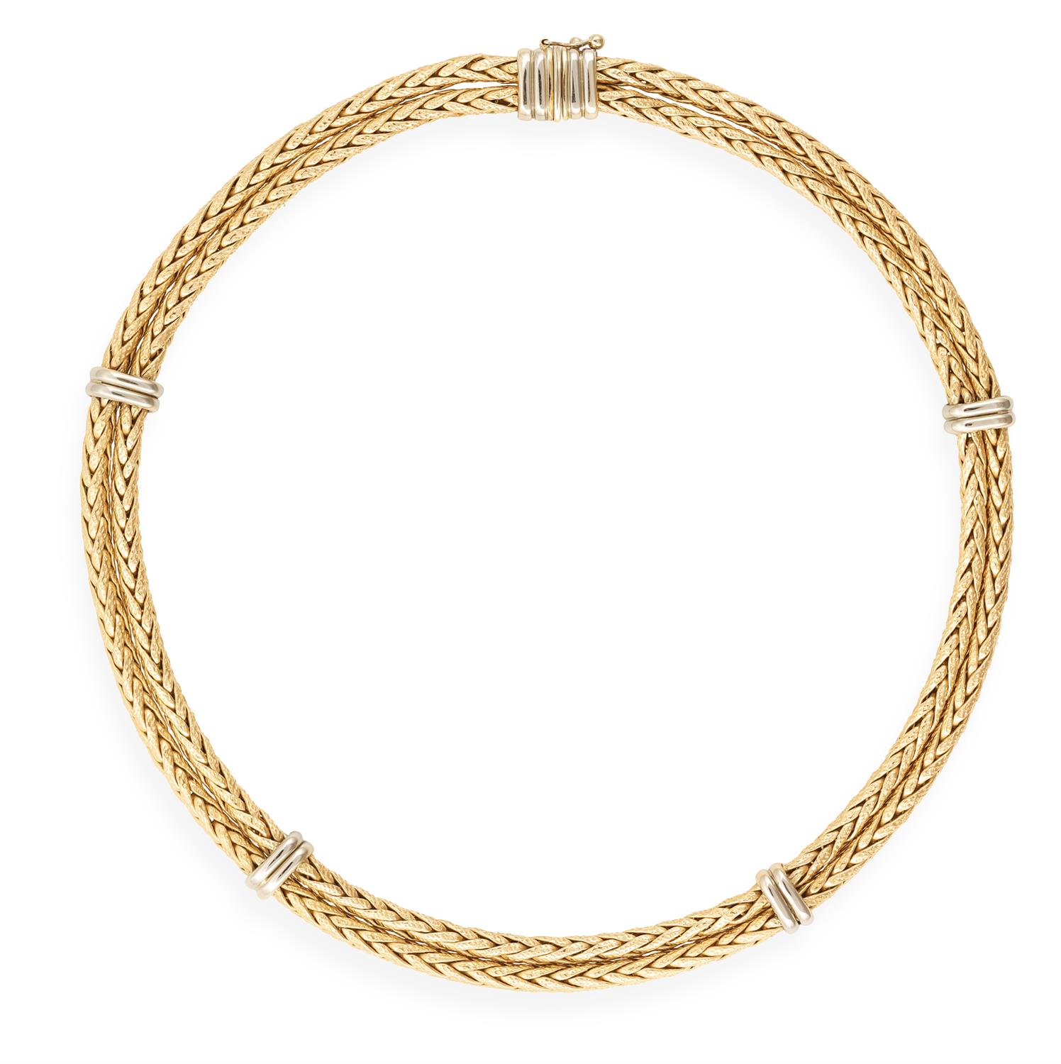 A GOLD NECKLACE, composed of two textured gold fancy-link chains joined with polished gold links, in