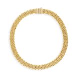A GOLD NECKLACE, composed of polished fancy gold links mounted in 18K gold, Italian assay mark,